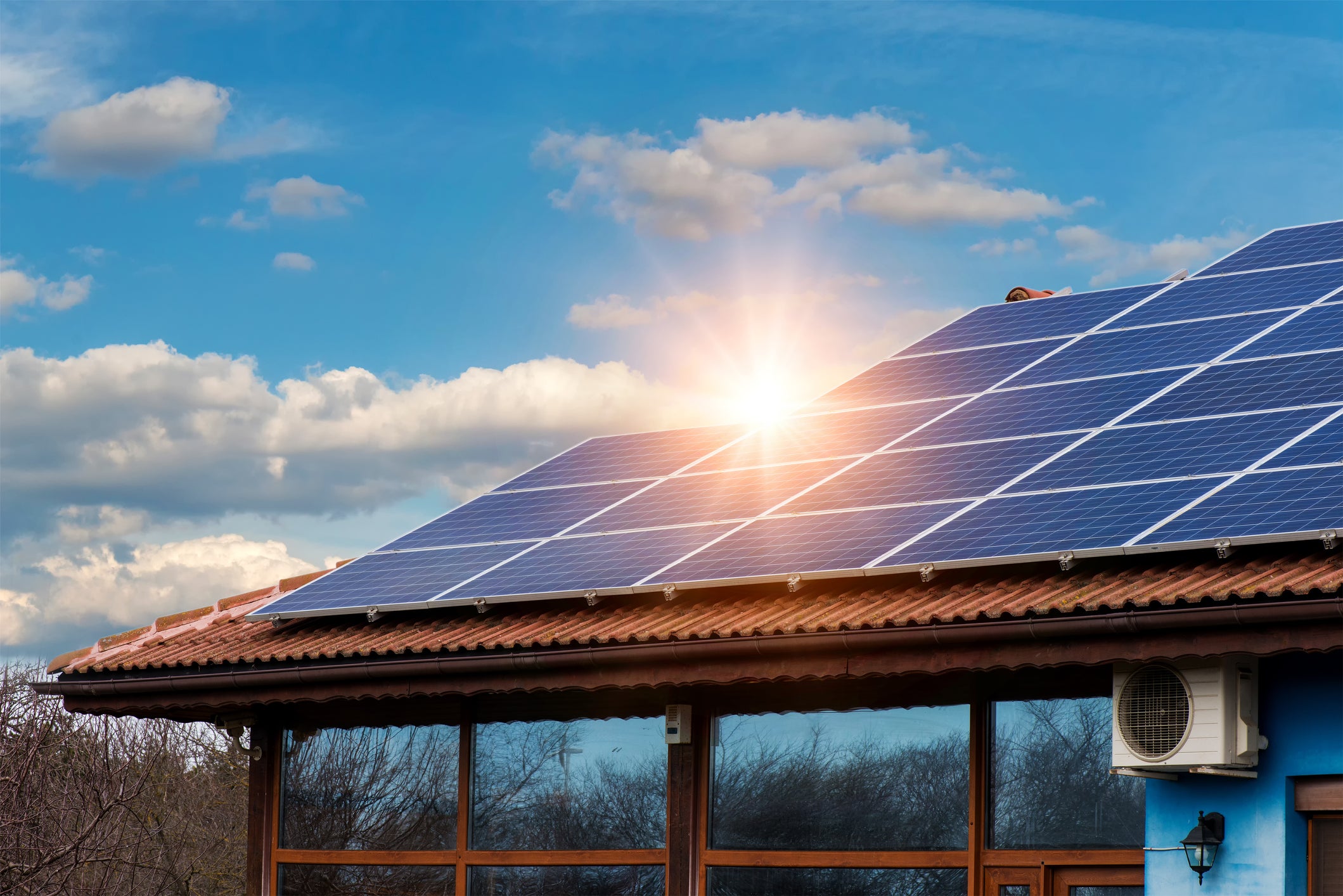 Rooftop solar panels on a modern residential home